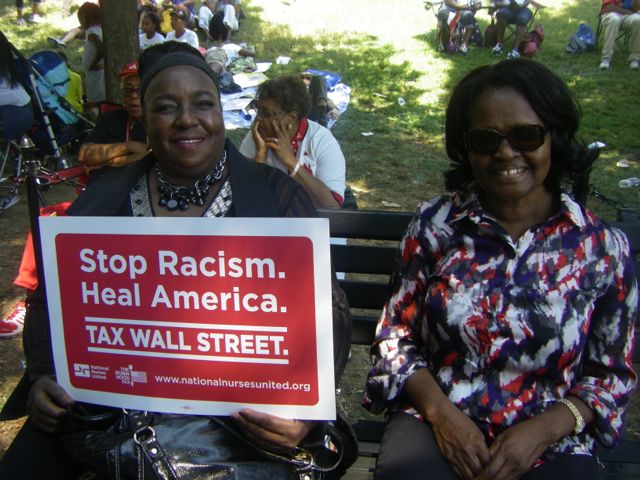 Jo Ann Watson and the Rev. Marcella Christie attend Saturday's rally commemorating the 50th anniversary of the 1963 March on Washington for Jobs and Freedom.